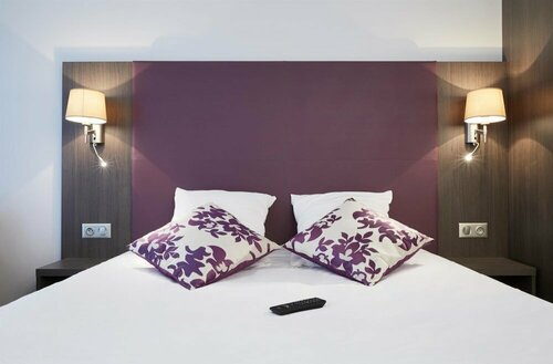 Гостиница Kyriad Saint Quentin EN Yvelines - Montigny в Монтиньи-ле-Бретонё