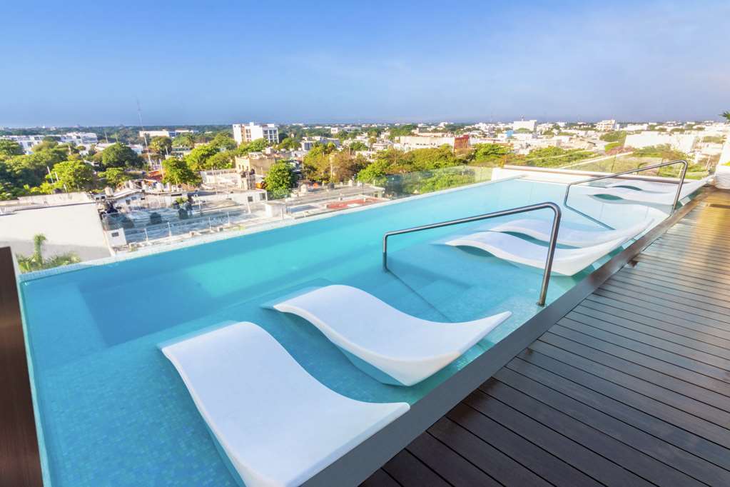 Фото Апартаменты The Fives Downtown Hotel & Residences, Curio Collection by Hilton