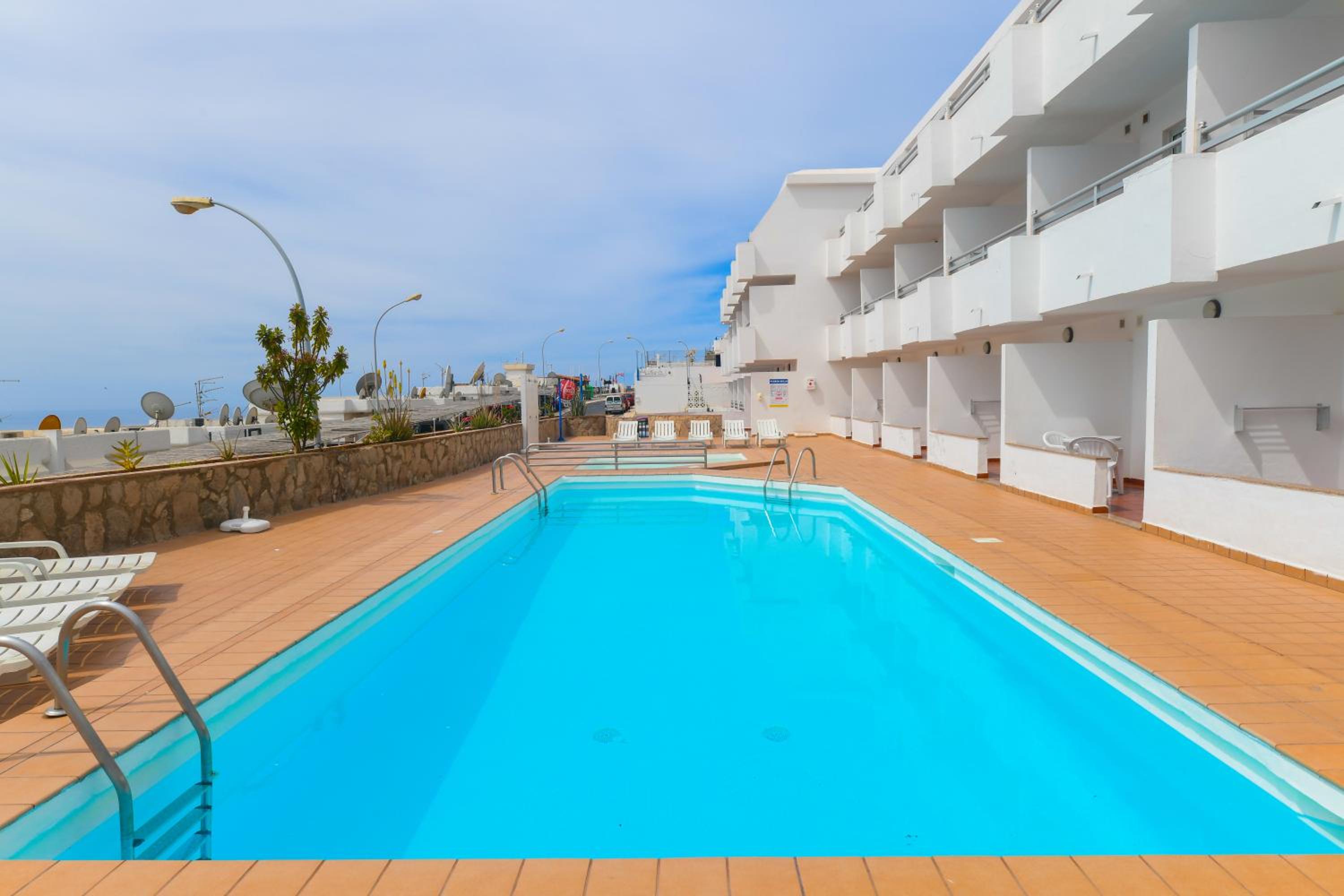 Фото Apartamentos Puerto Bello