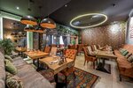 Gostidze (Tsentralniy Microdistrict, Sovetskaya Street, 65) ، مطعم