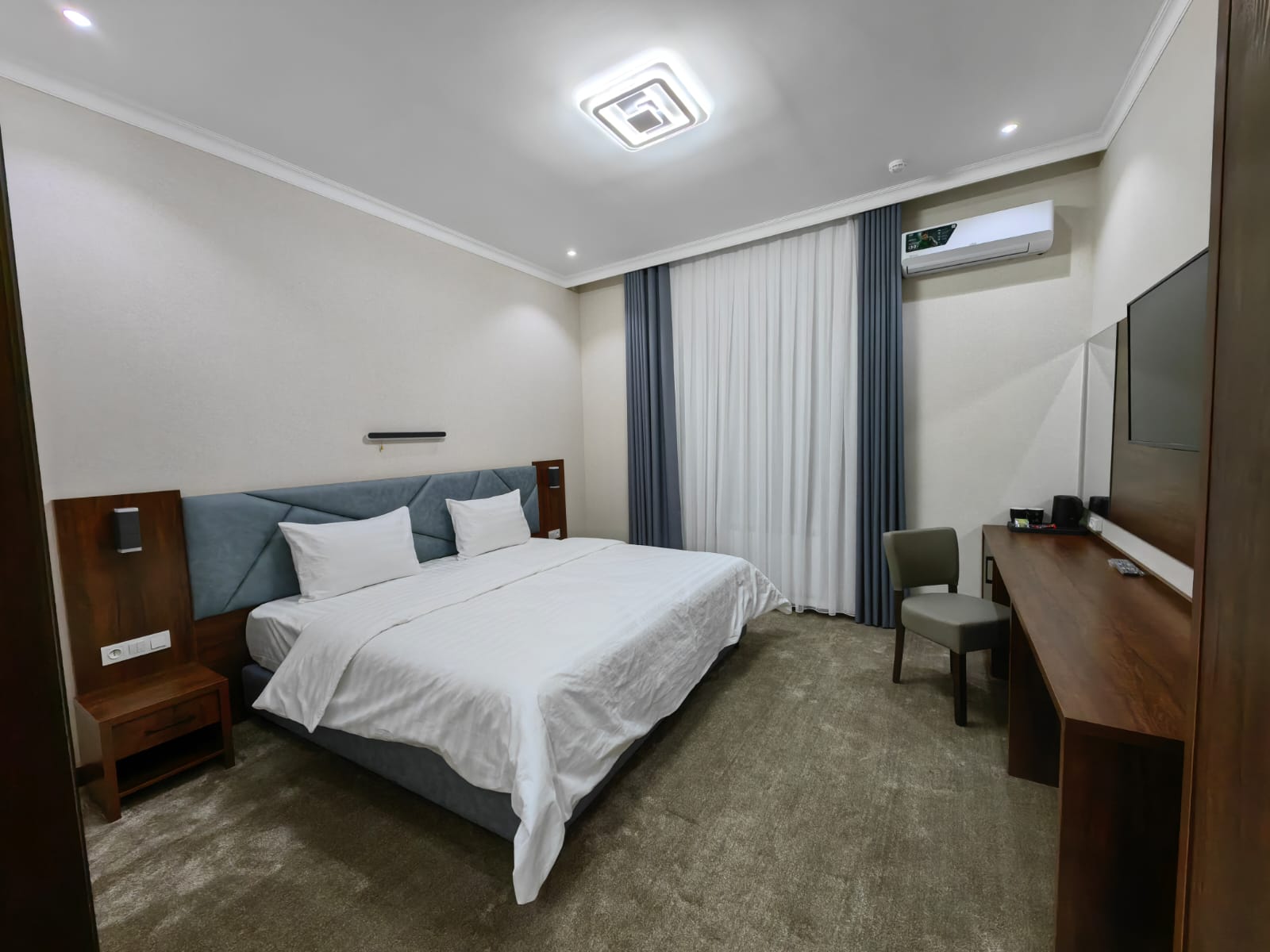 Фото Reikartz Qarshi Hotel