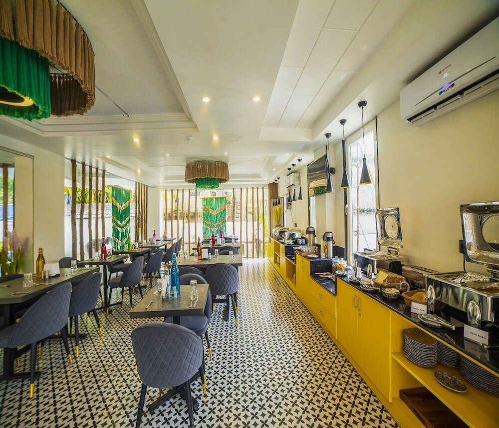 Фото Hue Guh The Porto Candolim