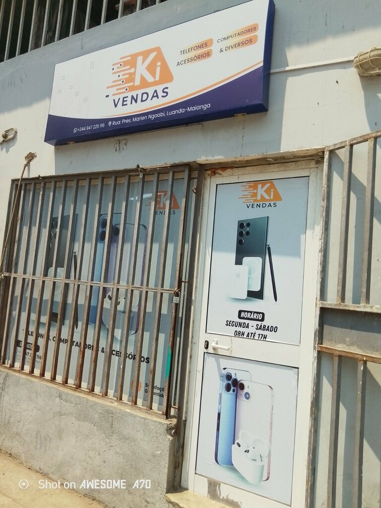 Mobile phone store Ki, Loanda, photo