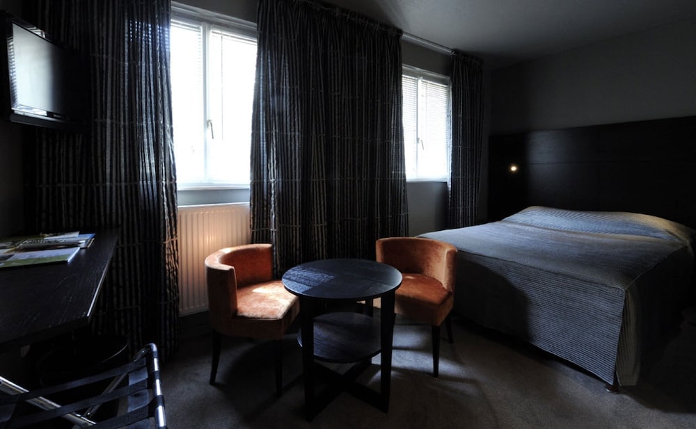 Фото Logis Hôtel Au Cerf d'Or