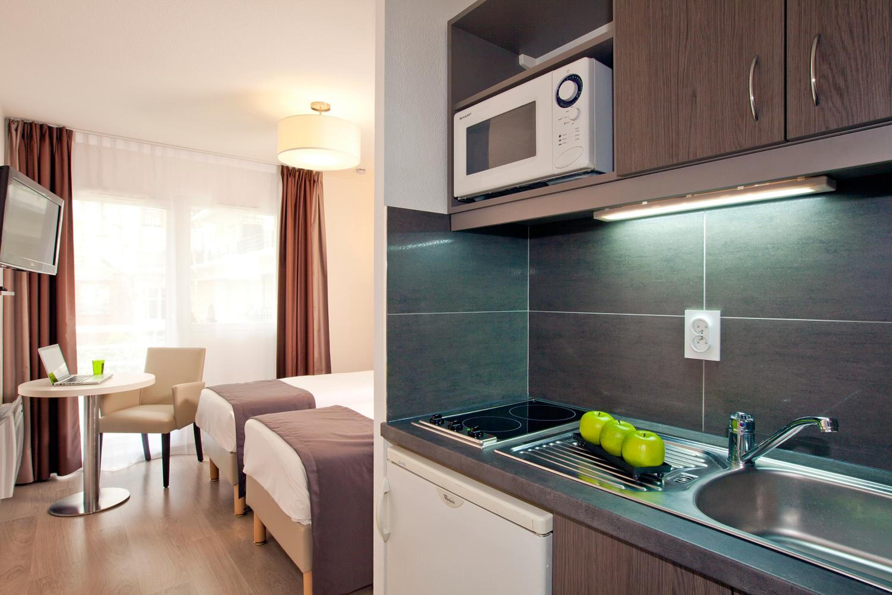 Фото Séjours & Affaires Courbevoie Grande Arche