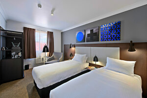 Гостиница CKS Sydney Airport Hotel