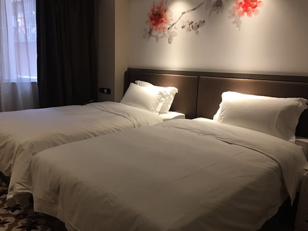 Фото Guangzhou Paco Hotel - Dongpu Teemall