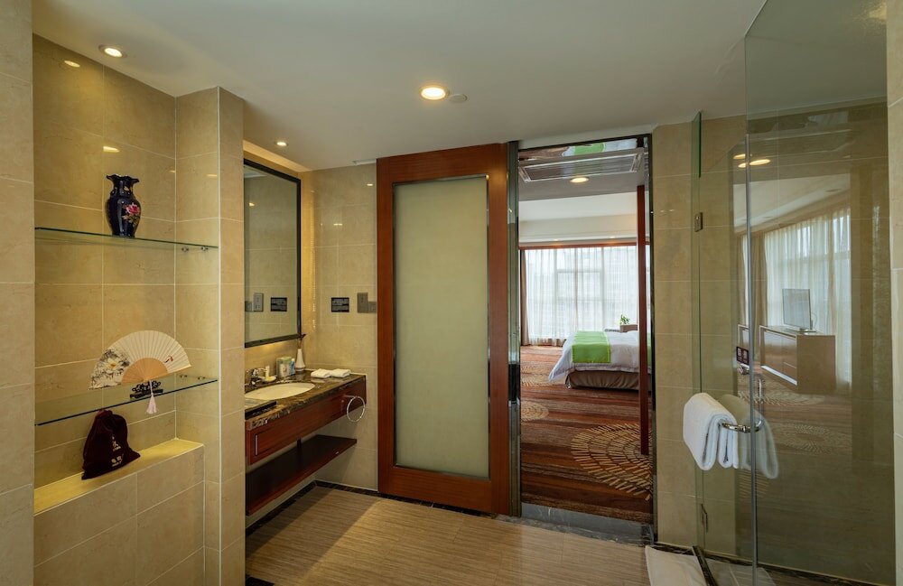 Фото Zhangjiajie Huatian Hotel