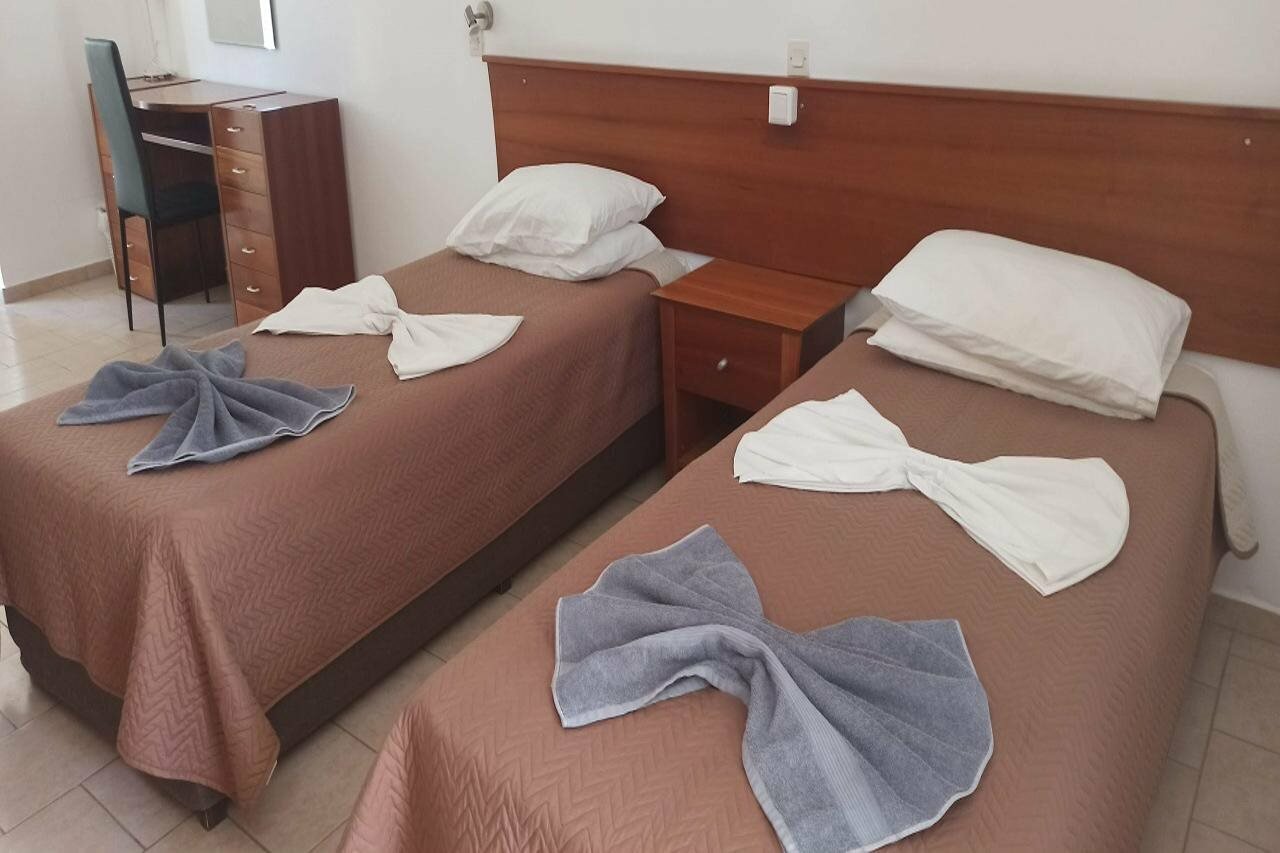 Фото Coliseum Studios & Apartments