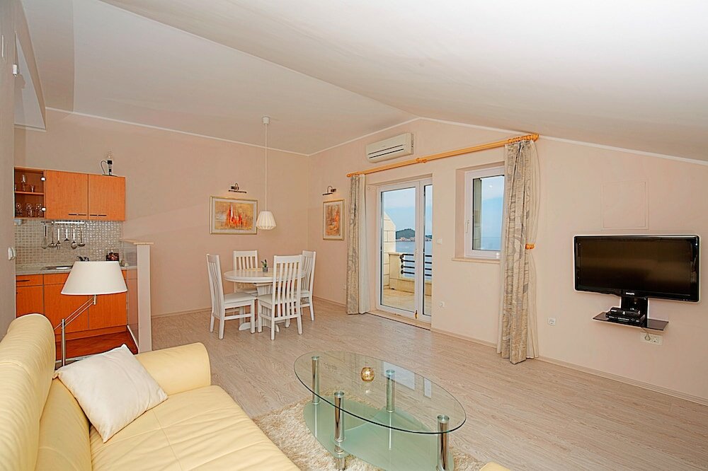 Фото Light Blue Apartment