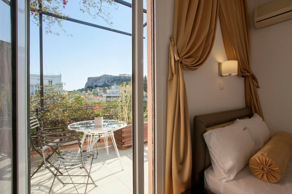 Фото Metropolis Hotel