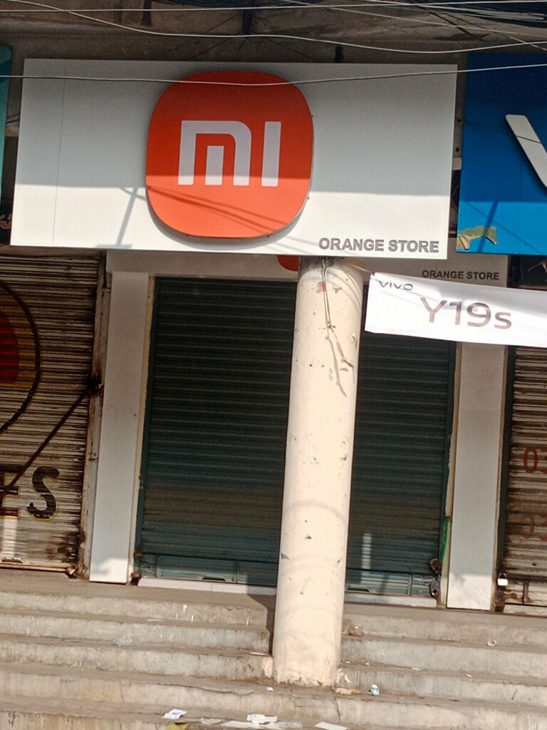 Items for mobile phones Orange Store, Lahore, photo