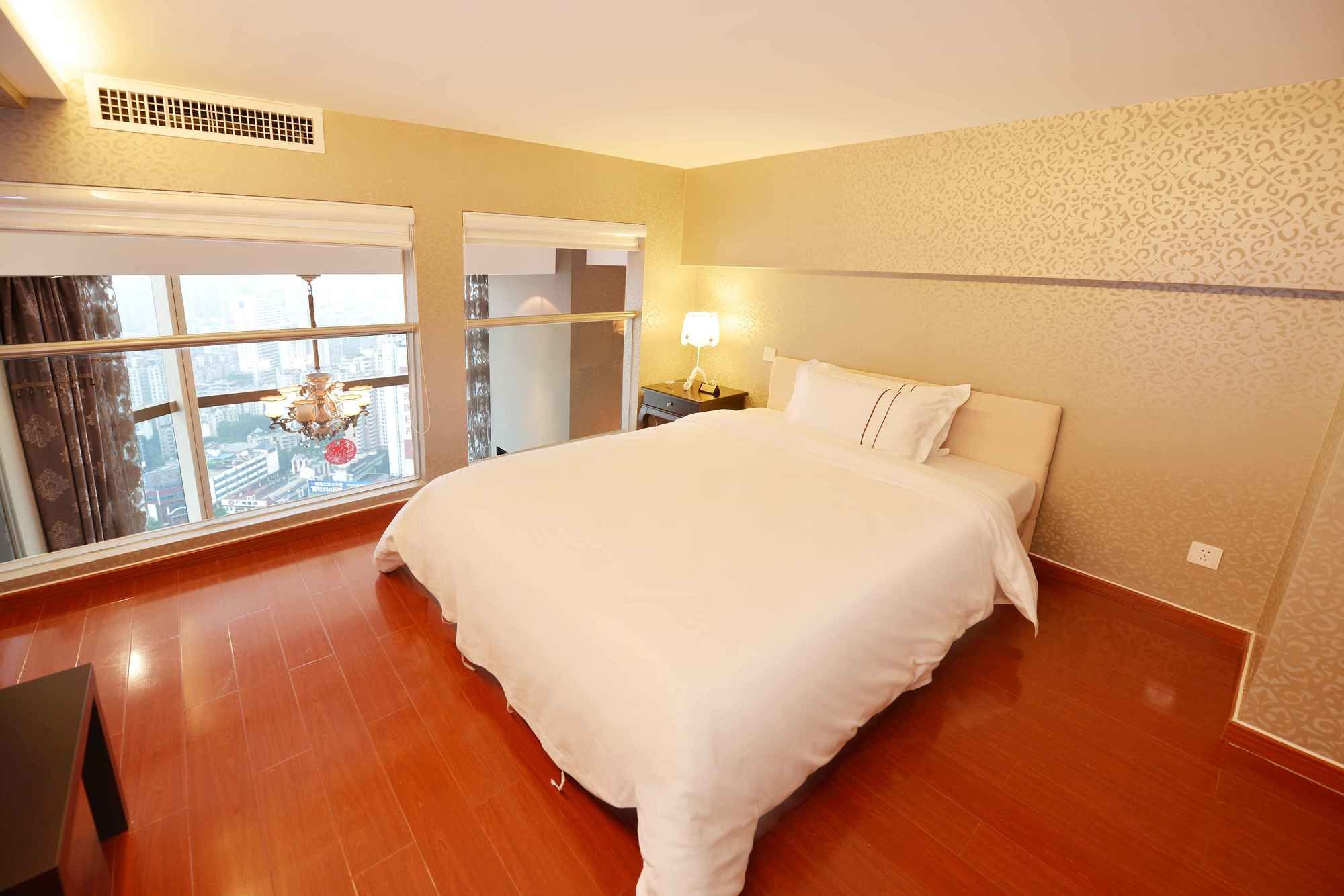 Фото Bodun International Serviced Apartment - Guangzhou