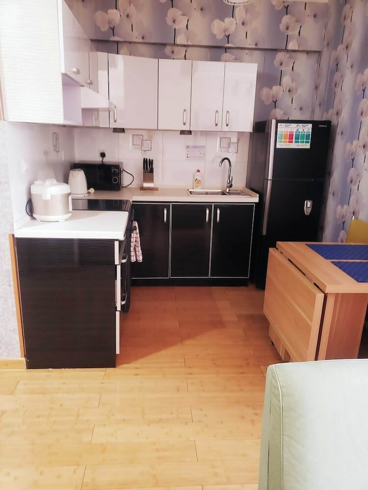 Фото Tanan Center Serviced Apartments