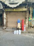 Dollar shop shop (Haq Nawaz Road, 42), grocery