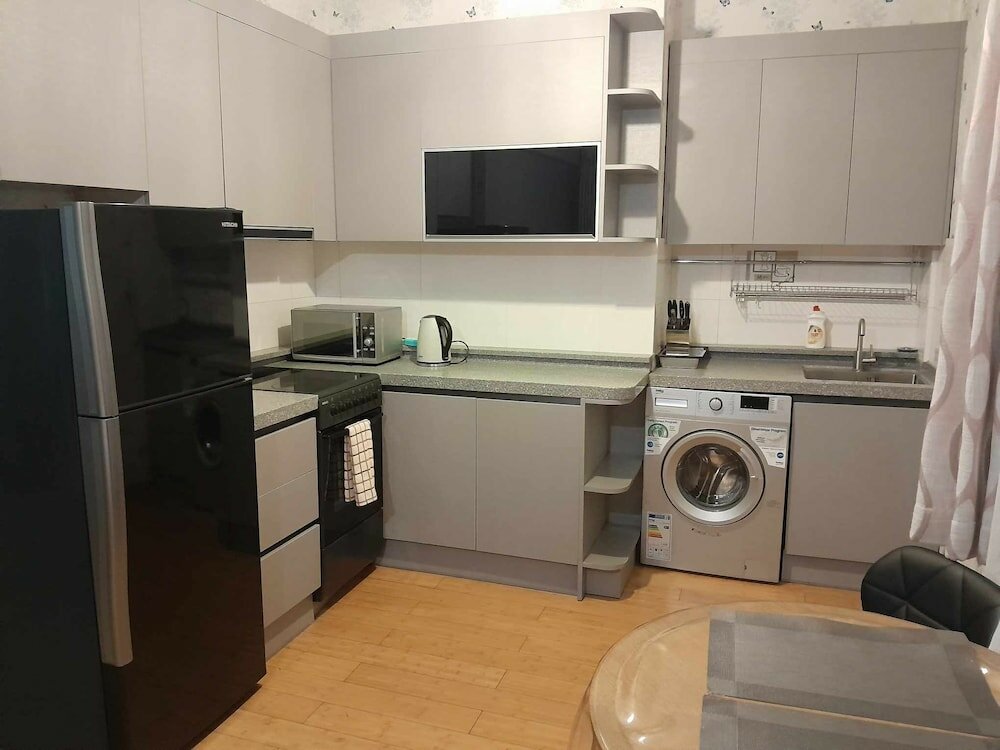 Фото Tanan Center Serviced Apartments