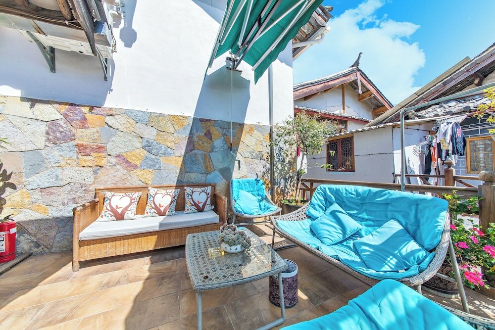 Фото Lijiang Xueshanyu Inn