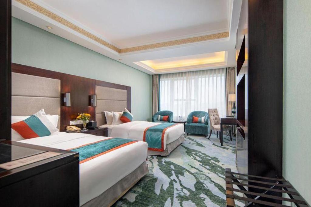 Фото Yimei Plaza Hotel