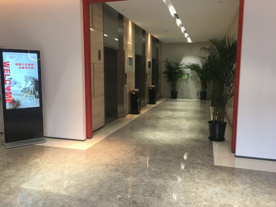 Фото Suisse Place Serviced Apartment Shanghai Zhongjian