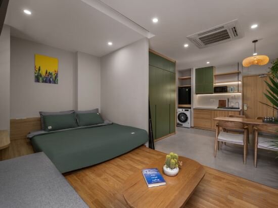 Фото Q Hotel & Apartment