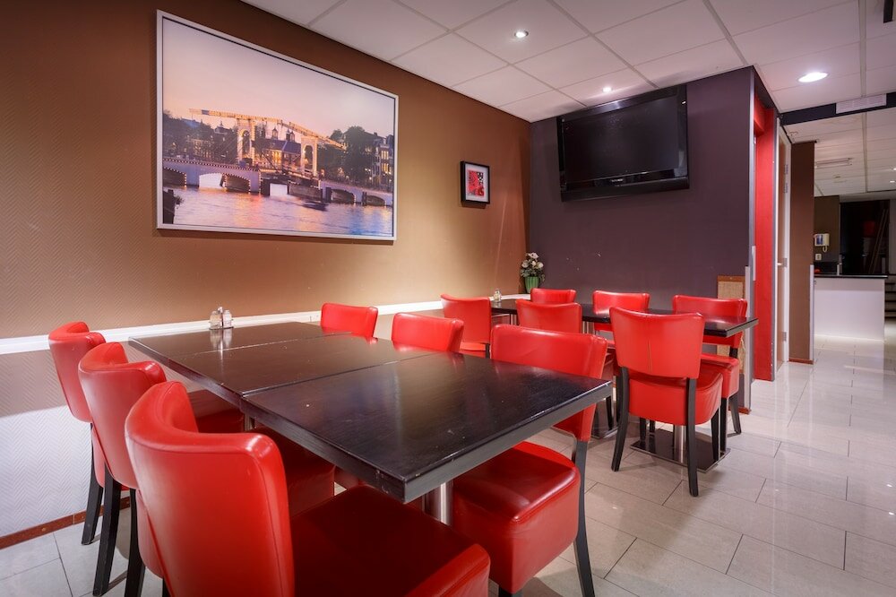 Фото Amsterdam Downtown Hotel