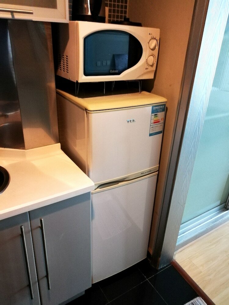 Фото Shanghai Abest Xinshikong Apartments