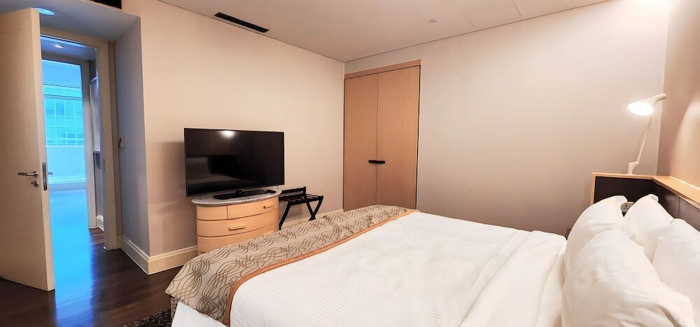 Фото Ascott Raffles Place Singapore