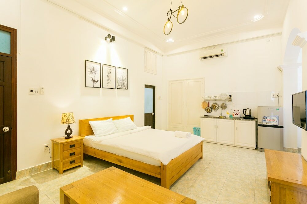Фото Halo Serviced Apartment