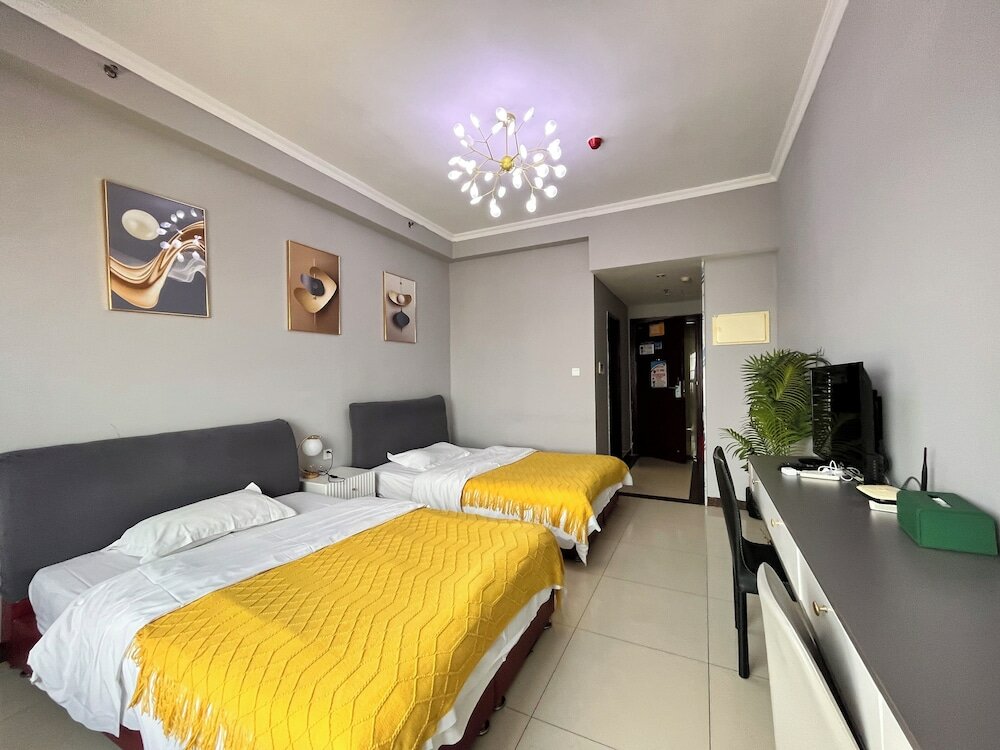 Фото Guangzhou Yi Long International Apartment