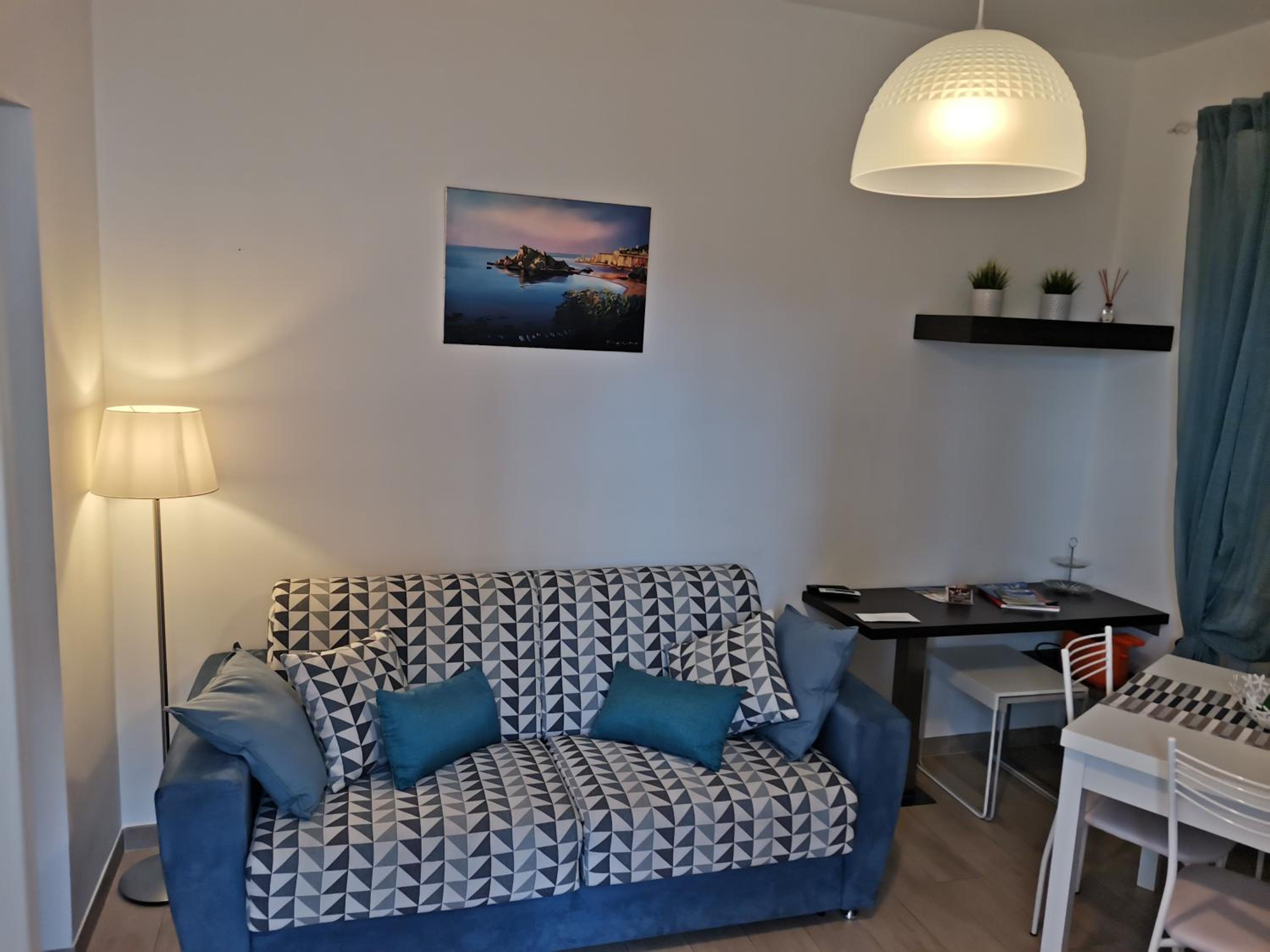 Фото Cartolina Apartment