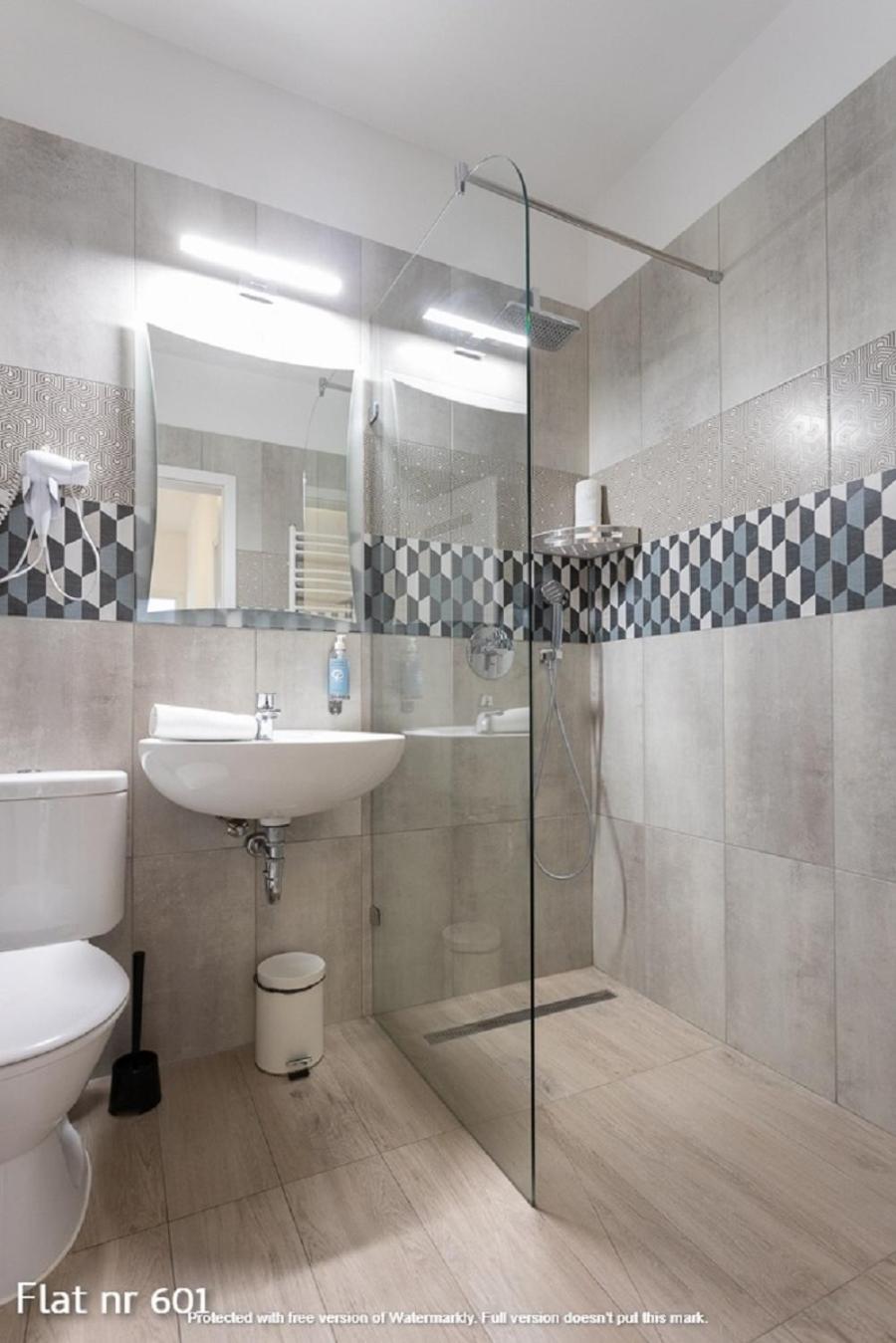 Фото Corvin Plaza Apartments and Suites