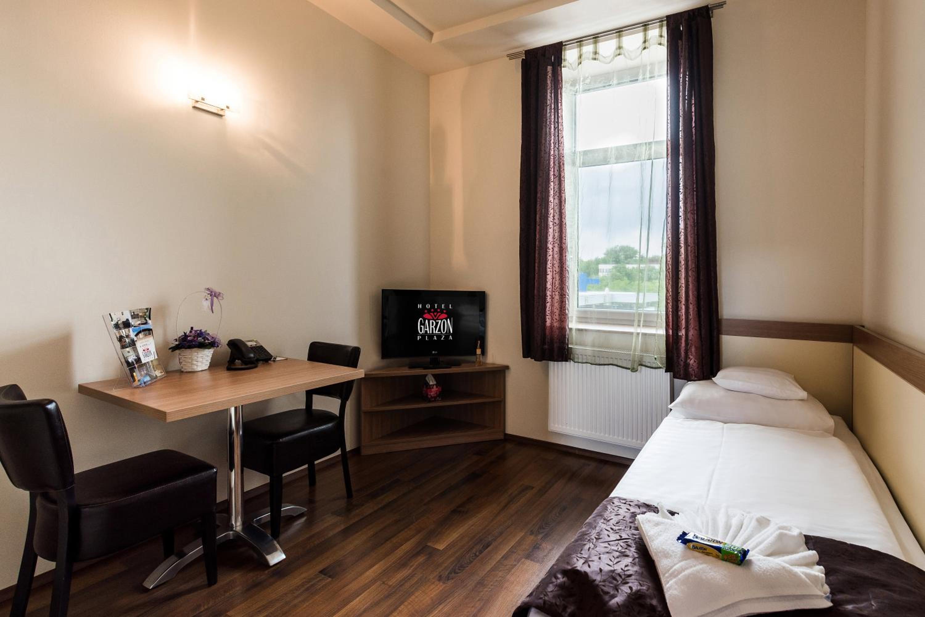 Фото Garzon Plaza