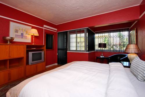 Фото 40 Winks Guest House Green Point Cape Town