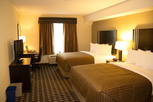 Гостиница Sigma Inn & Suites Melville