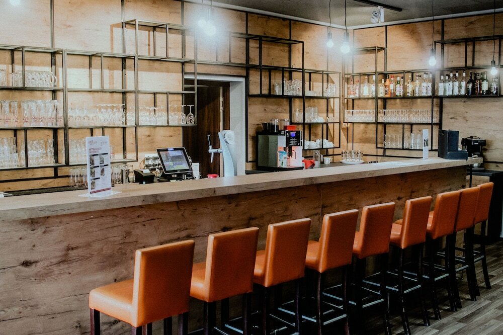 Фото Orange Hotel und Apartments