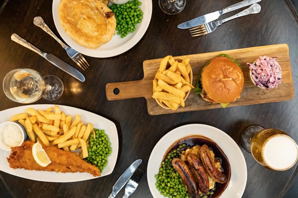 Фото The New Inn by Roomsbooked