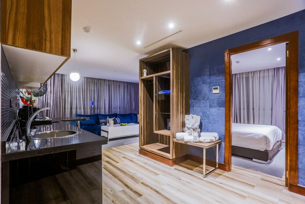 Фото Sbn Suites Hotel