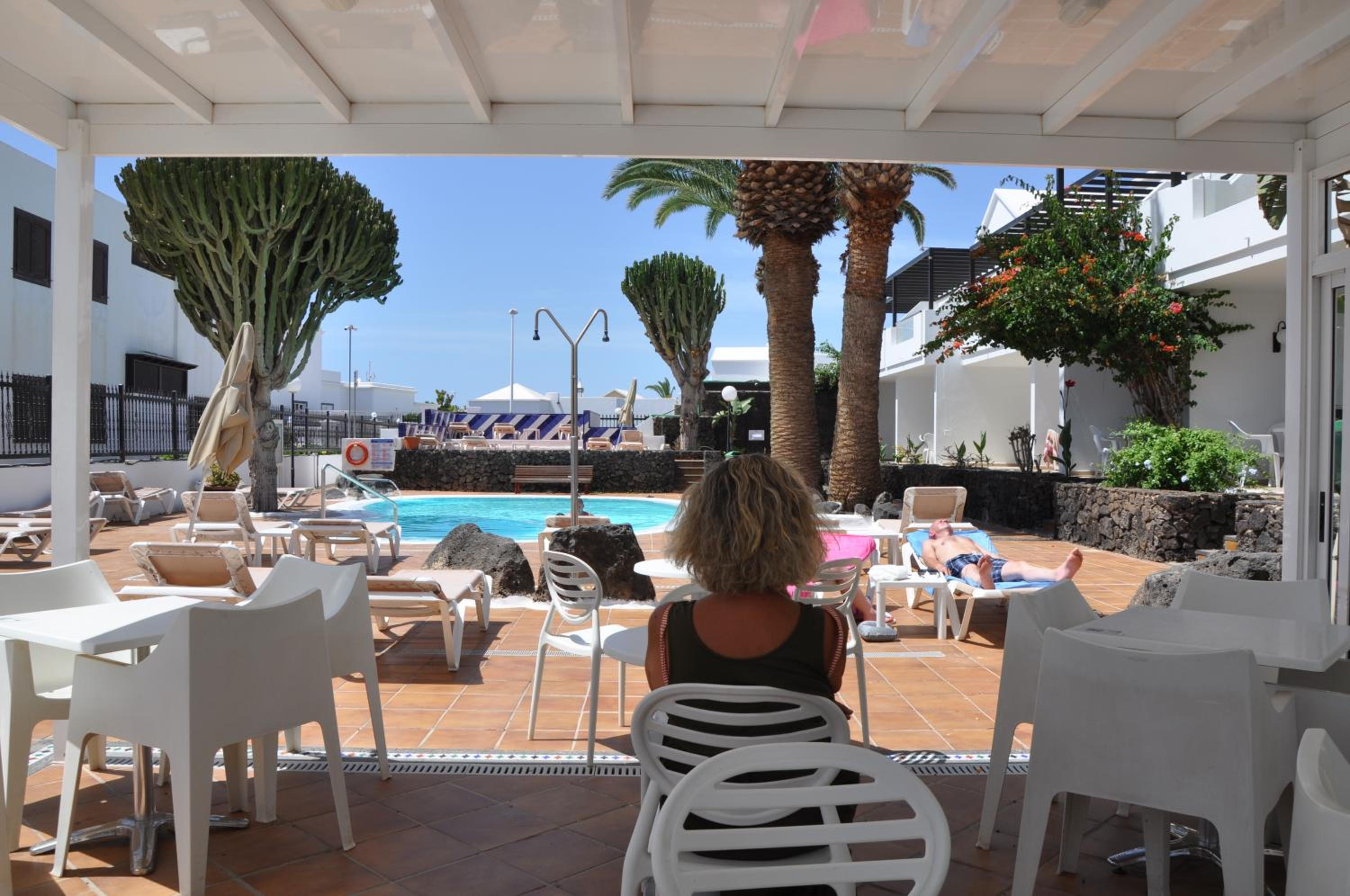 Фото Apartamentos Los Tulipanes