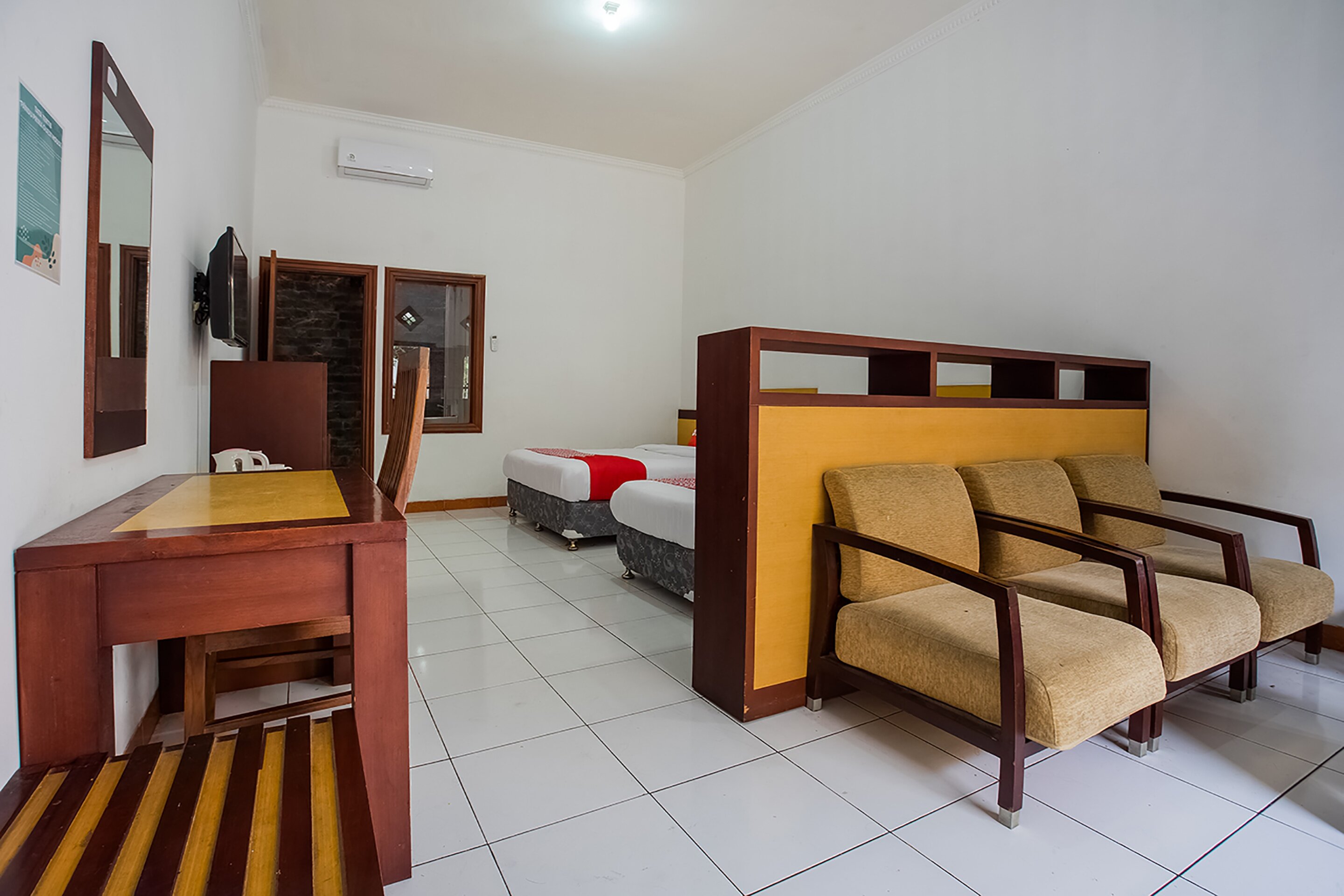Фото Super Oyo 3406 Pandu Prima Guest House Syariah