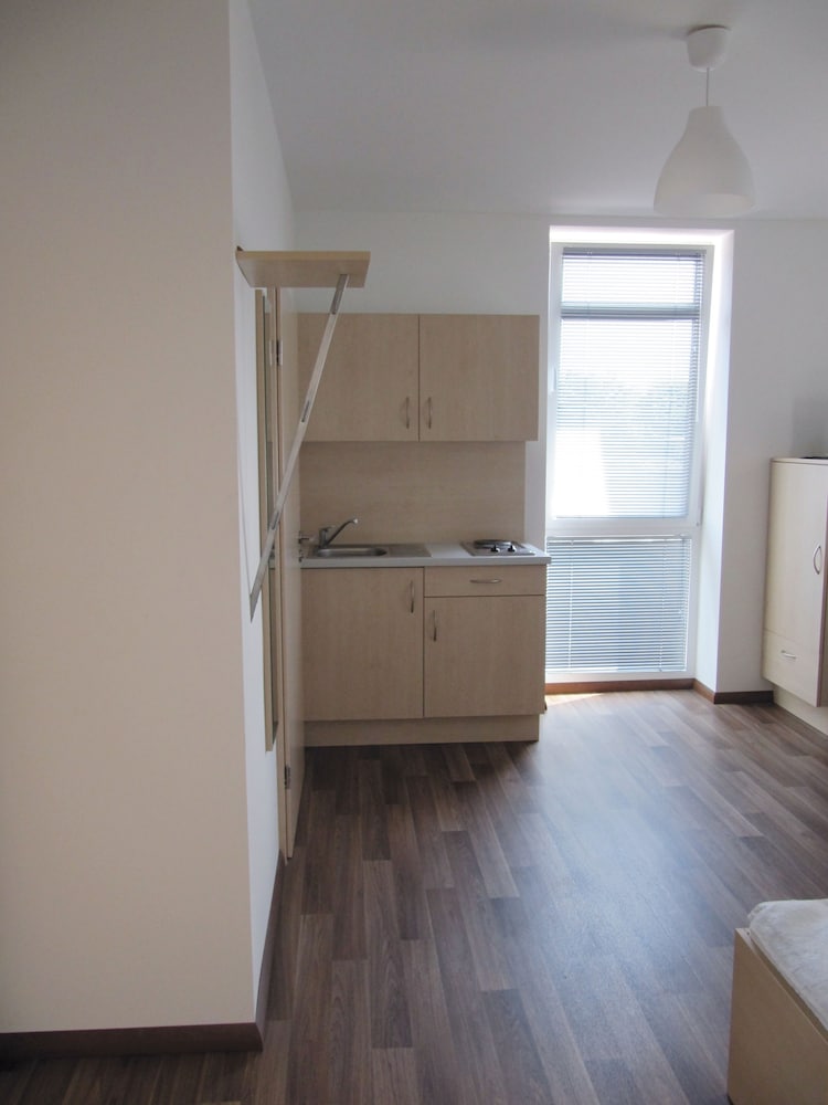 Фото Orange Hotel und Apartments