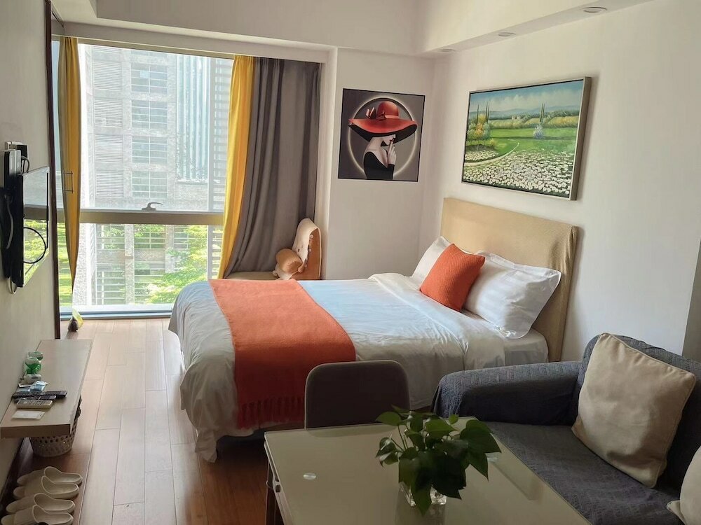 Фото Guangzhou Damei Apartment