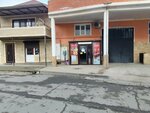 Гастроном (Khizroeva Street, 93/3) ، محل بقالة