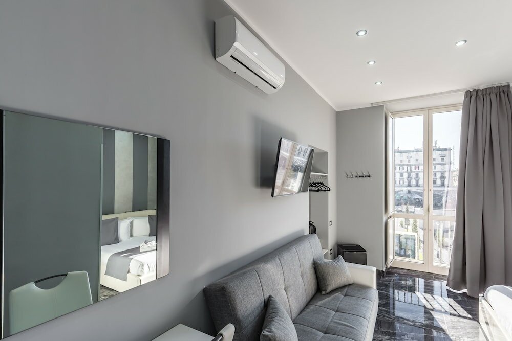 Фото Hotel Bella Napoli Suites