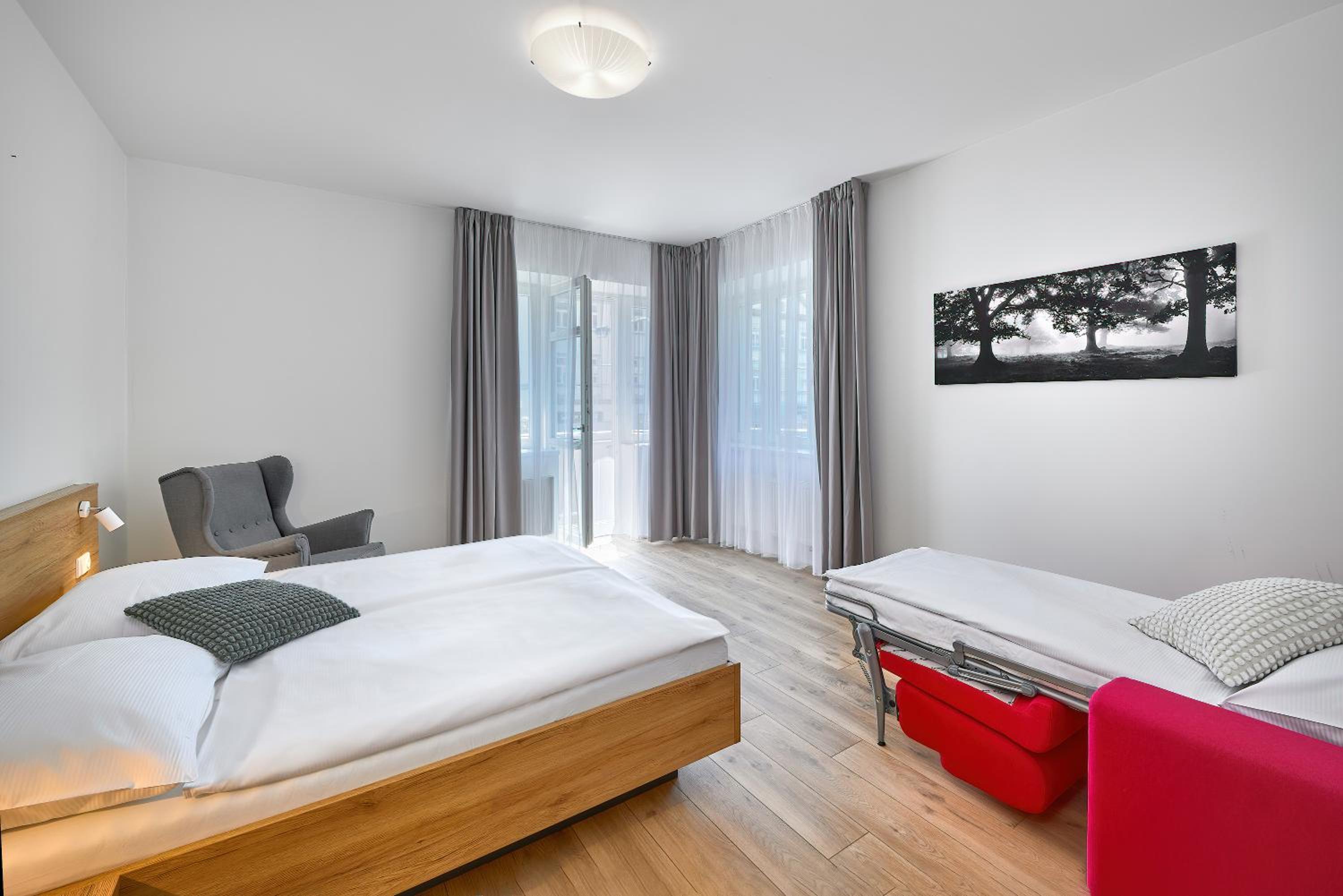 Фото Downtown Suites Belohorska