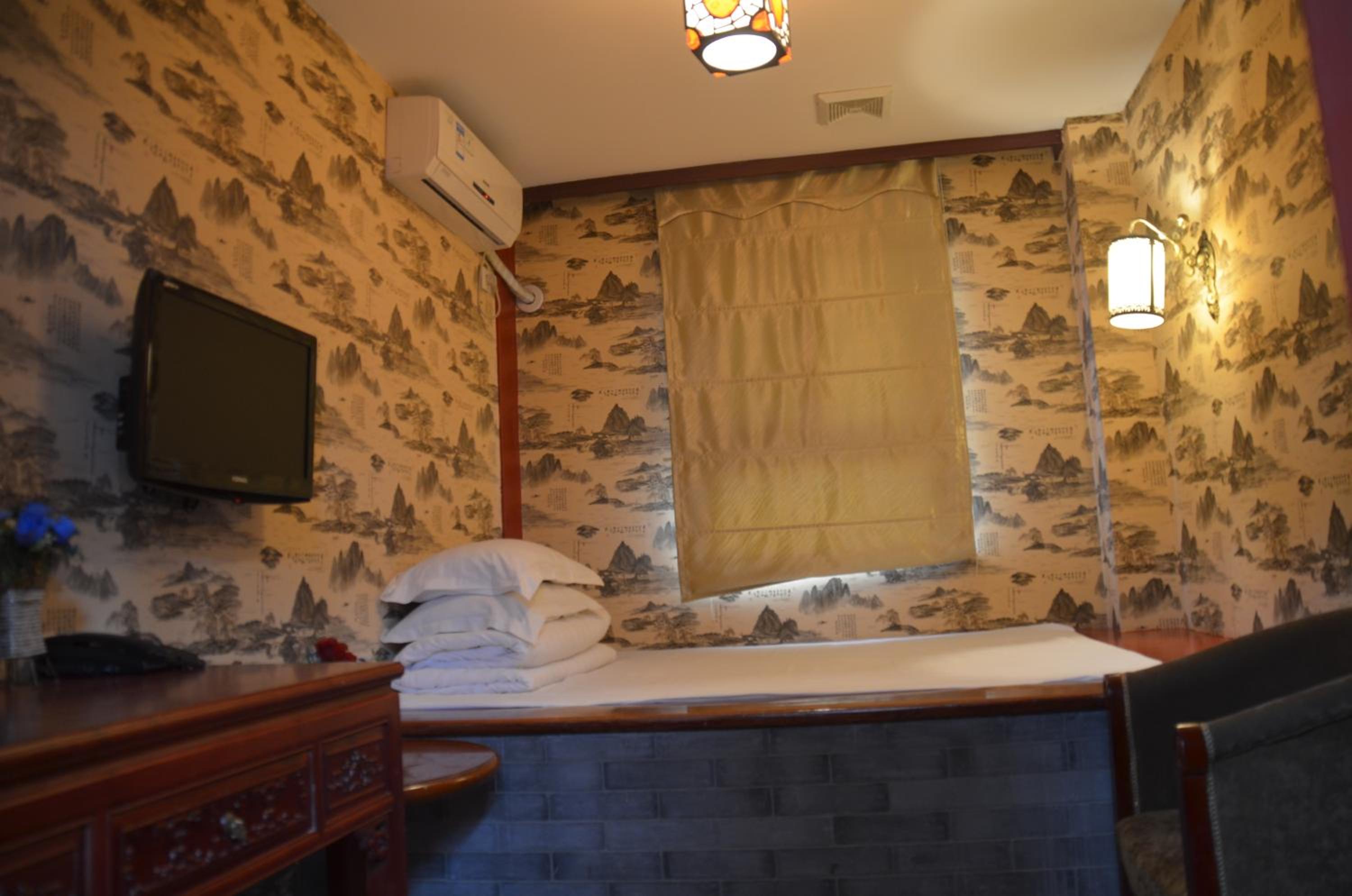 Фото Qianmen Courtyard Hotel