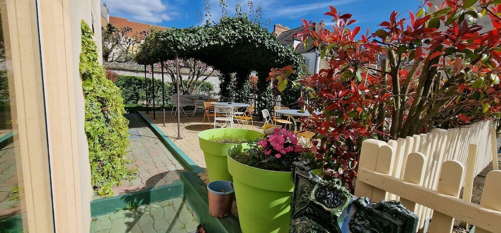 Фото Kyriad Direct Arpajon