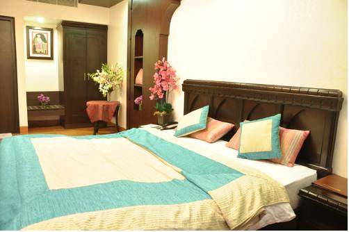 Фото Hotel Rockland Panchsheel Enclave