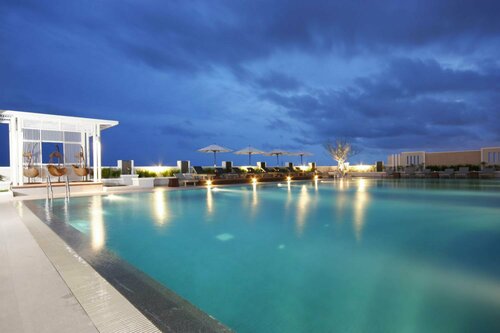 Гостиница Kameo Grand Rayong Hotel & Serviced Apartments в Районге