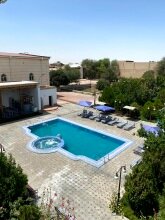 Фото Qibla Tozabog