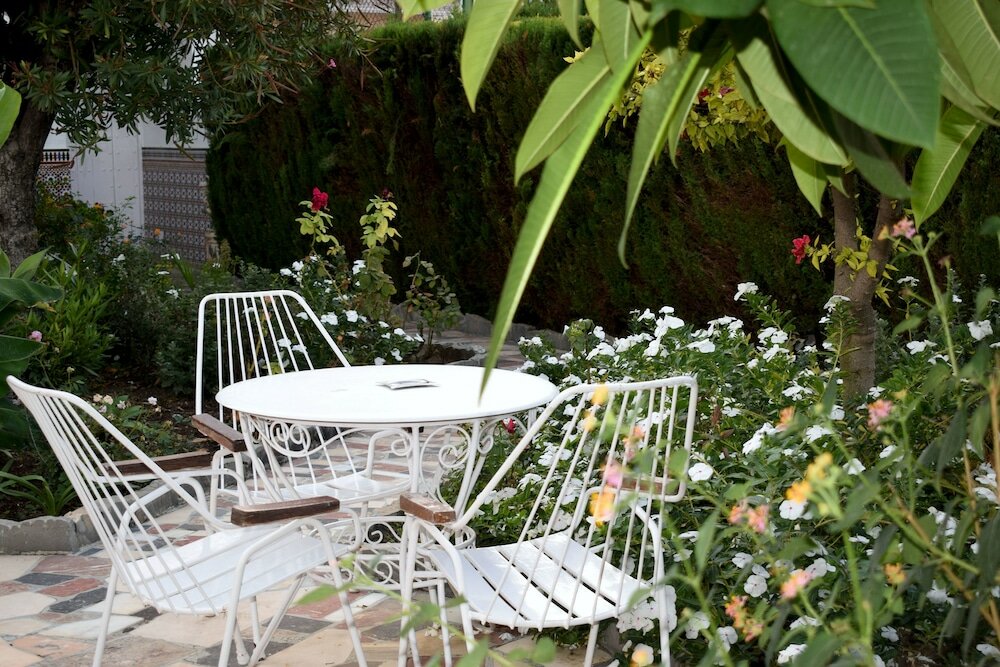 Фото Apartamentos El Jardin